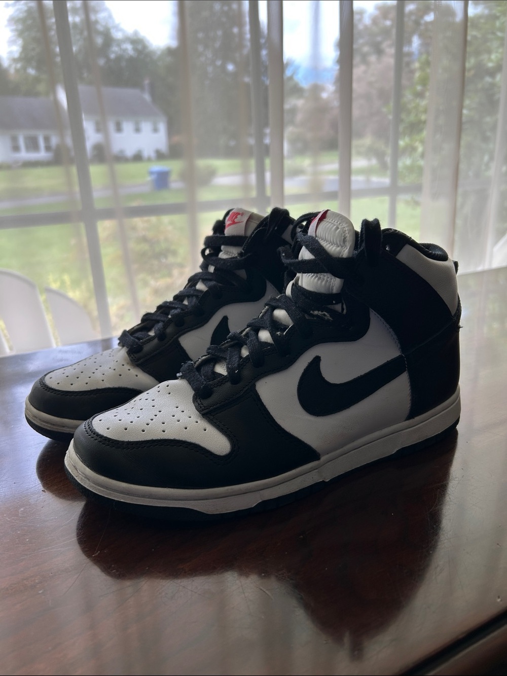 Nike Women’s Black and White High-Top Sneakers